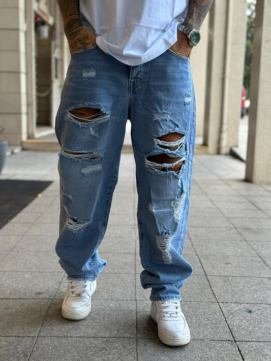 Jeans over chiaro fondo largo con strappi